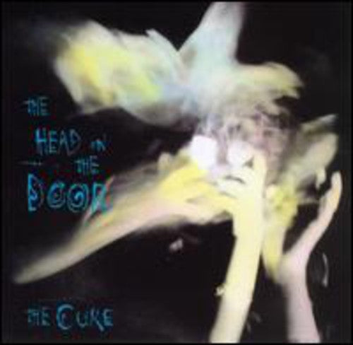 Cure - Head On The Door